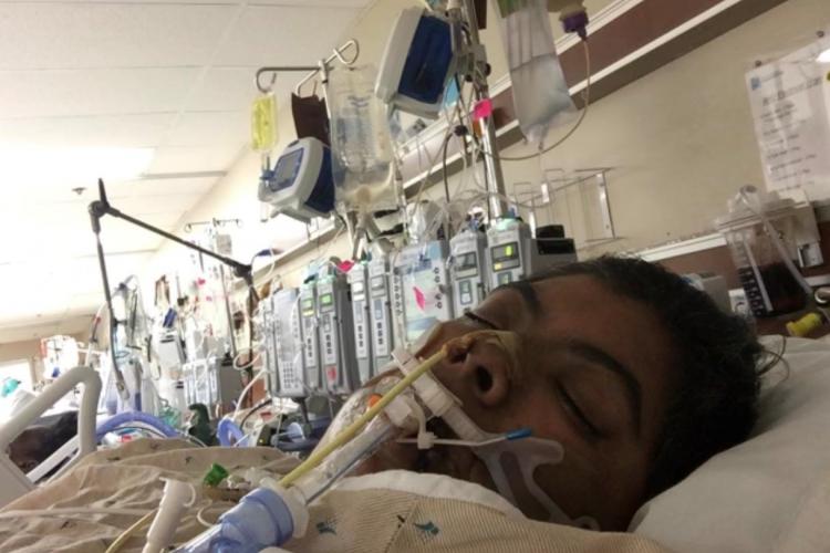 In a photo she submitted, Jennifer Hernandez battles COVID-19 in a bed at JPS Health Network in Fort Worth, Texas.
