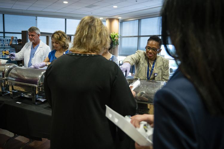 Trudy Sanders and other JPS team members.