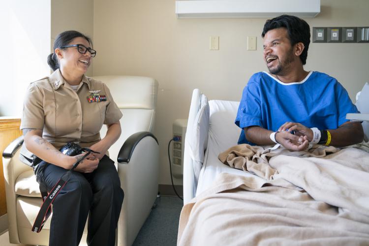 Karina Vargas shares a laugh with Sohail Rajan