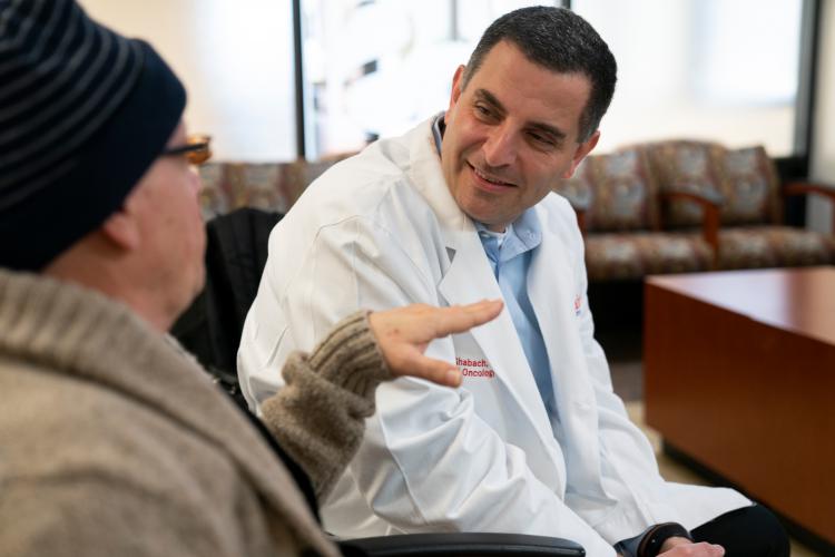 Patient Mark Howell discusses his treatment with Dr. Bassam Ghabach, Medical Director at the JPS Center for Cancer Care in Fort Worth, Texas