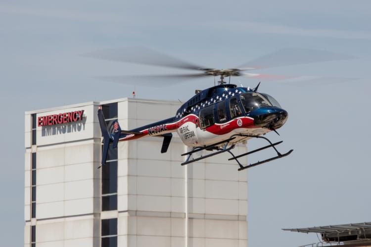 A rescue helicopter lands at JPS