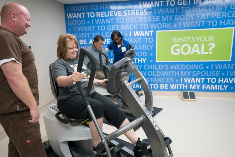 Cardiac Rehab physical therapist Doug Clemmer works with a patient