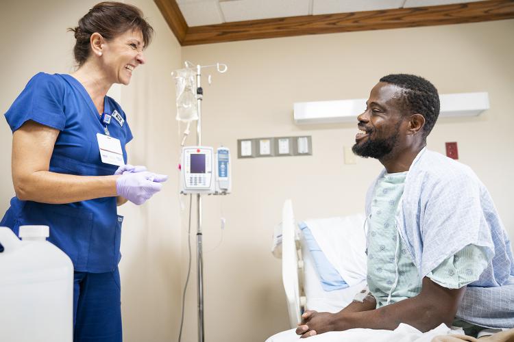 Nurse Nergis Blood prepares a patient for an operation