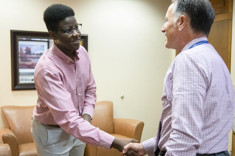 Allan Njomo meets JPS Health Network President and CEO Robert Earley