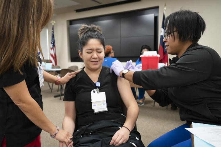 JPS team member receiving a flu shot