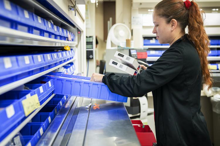 JPS Health Network Inpatient Certified Pharmacy Technician Elienid Budd fills a prescription