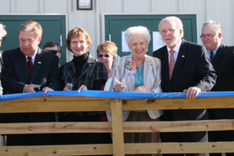 Georgia Kidwell cuts the ribbon at the school-based health center named in her honor in 2009