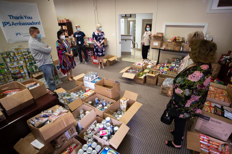 More than 18,000 food items fill the JPS Foundation office waiting to be distributed to Fort Worth area food pantries.