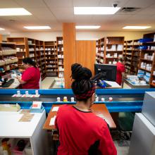 JPS Health Network pharmacists work to fill prescriptions.