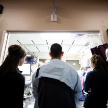 A team of trauma providers watch a case in the Level I Trauma Center at JPS Health Network in Fort Worth Texas.