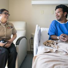 Karina Vargas shares a laugh with Sohail Rajan