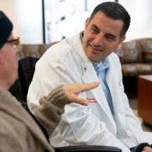 Patient Mark Howell discusses his treatment with Dr. Bassam Ghabach, Medical Director at the JPS Center for Cancer Care in Fort Worth, Texas