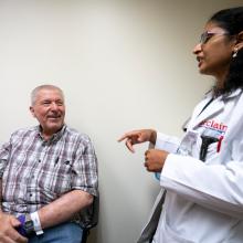 JPS Health Network Oncology and Infusion Center Patient Jerry Bitner discusses his case with Dr. Kalyani Narra