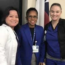 RNs Christi Nguyen (L) and Ashley Hall (R) accept a Good Catch Award from Vice President of Patient Care Trudy Sanders (center) on behalf of T3 Nurses.
